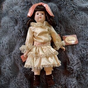 Russ Cream and Brown Collector Dolls with Intricate Lace